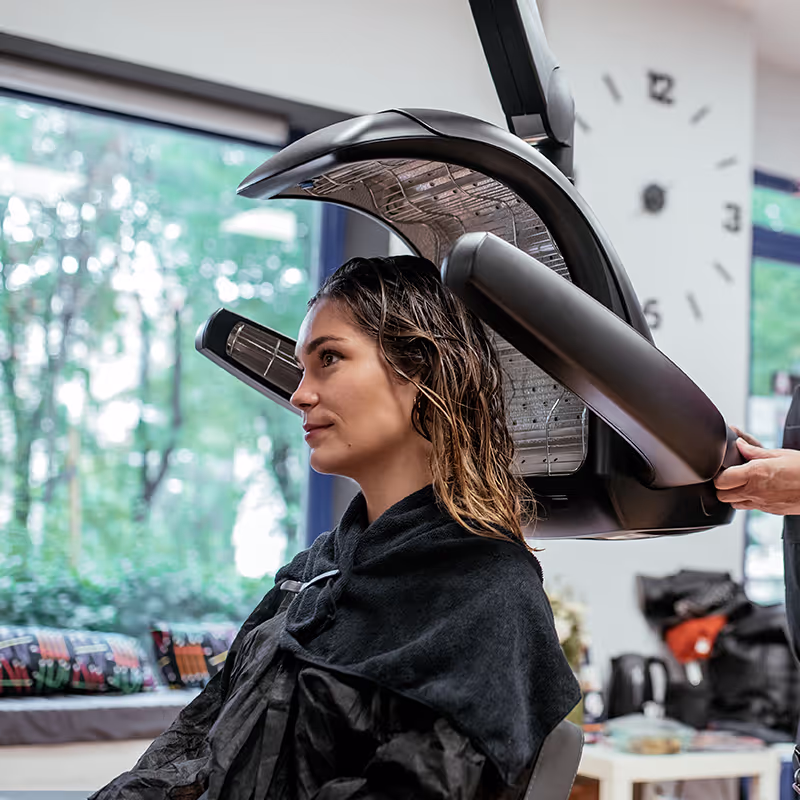 Conditioning treatment processing under a hooded dryer