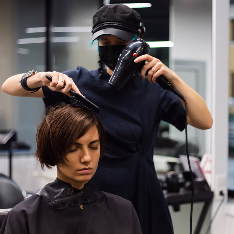Blow-dry finish shaped with a round brush